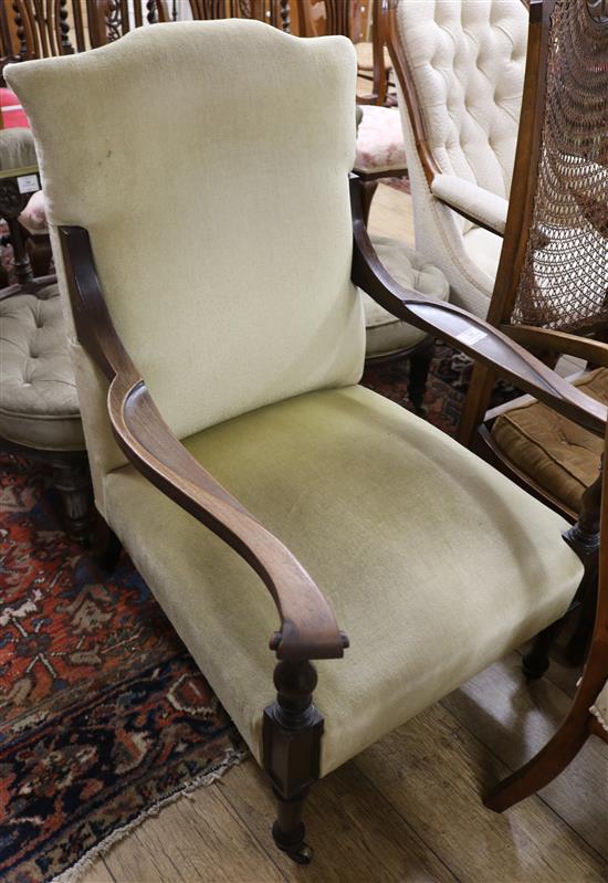 An Edwardian mahogany framed club armchair